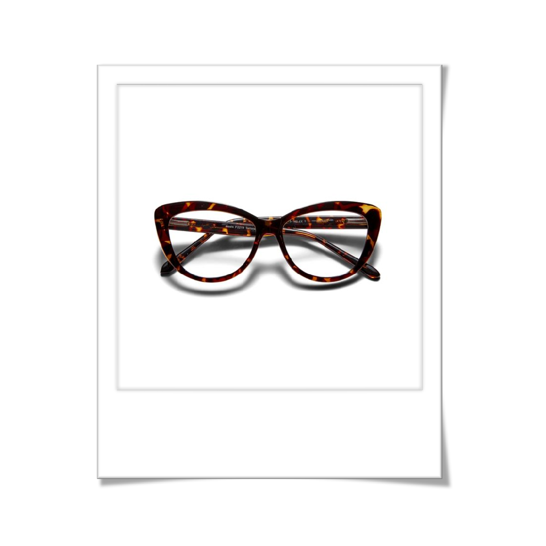 Photo of new glasses. They are cats eye rimmed and tortoiseshell colour. On a white background 