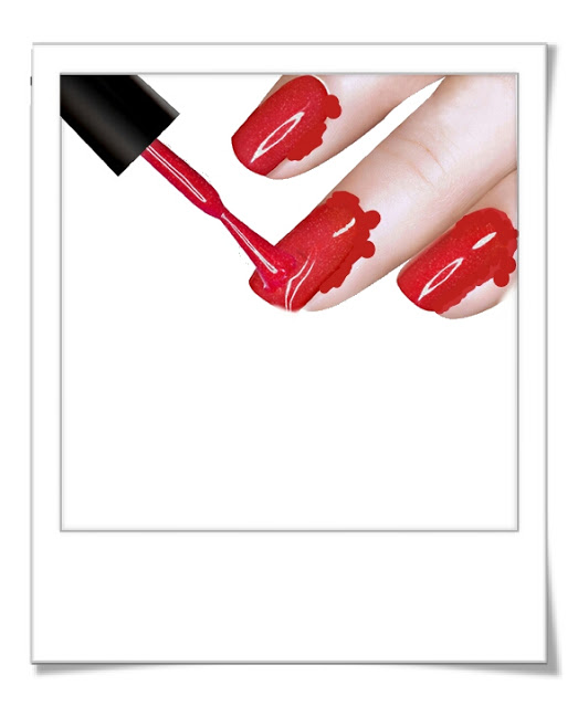 Womans fingers with badly applied red nail varnish 