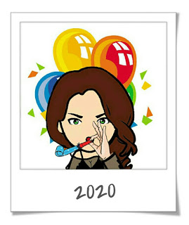 Woman blowing into party blower 