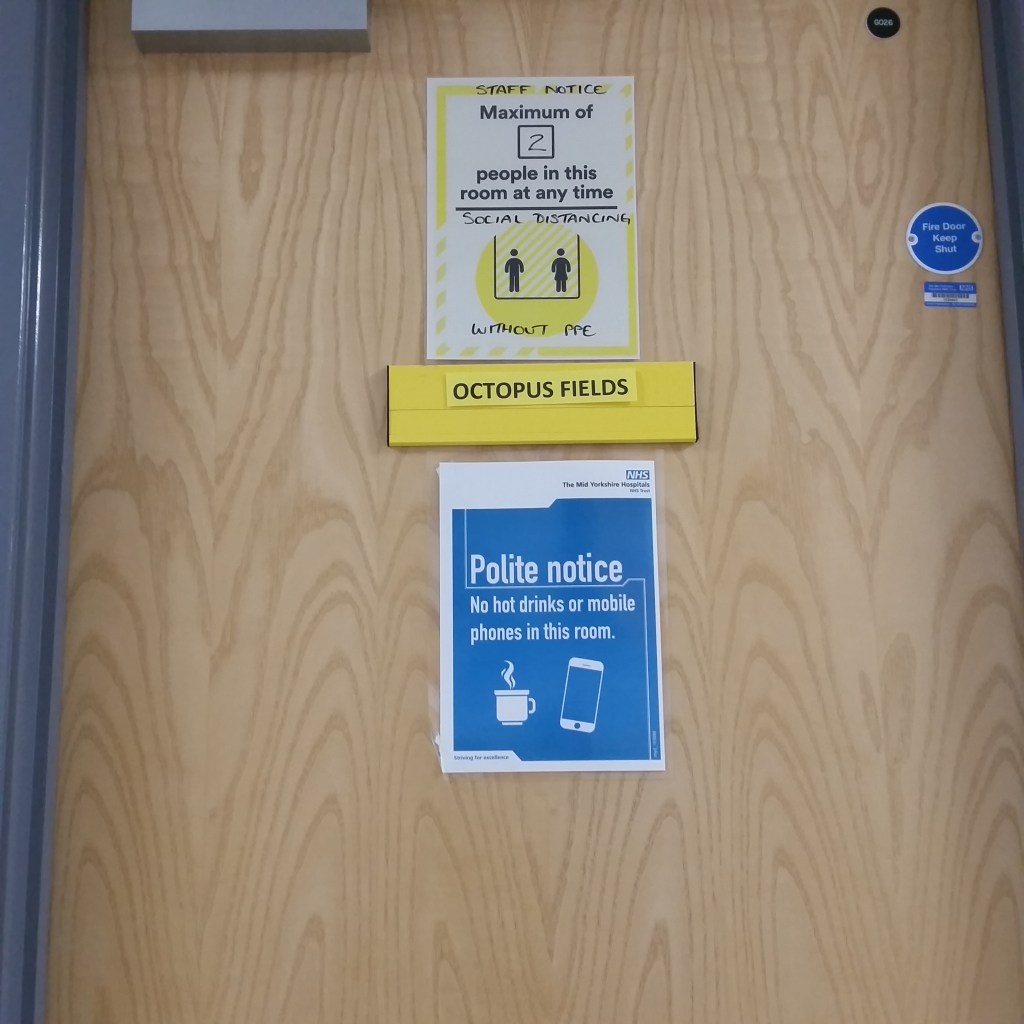 Door with sign. Octopus Fields