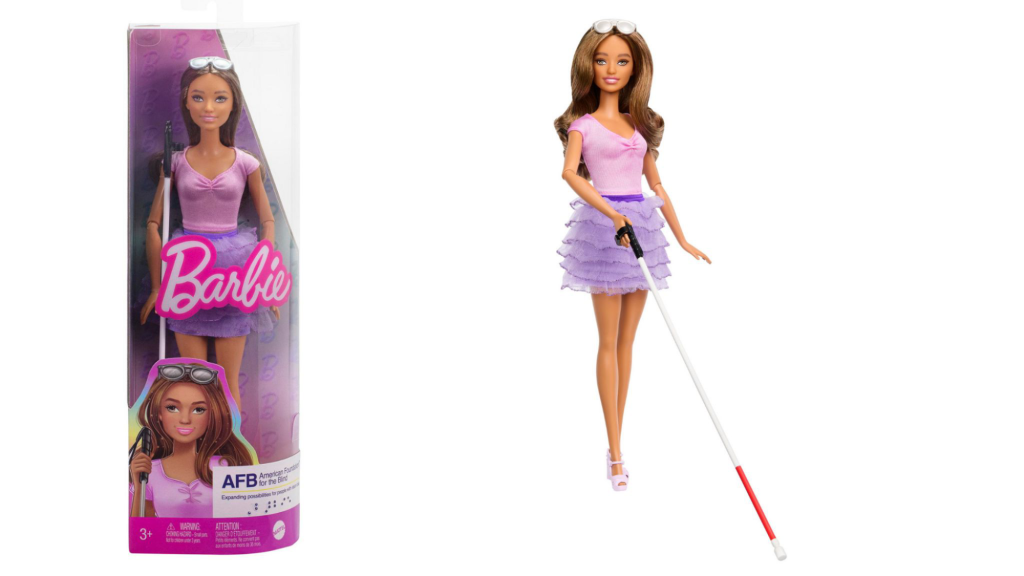 Long Brown haired doll wearing pink top and lilac rara skirt. Has a long white cane and sunglasses placed on her head
