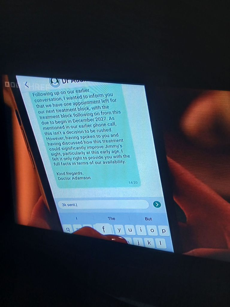 A close up of the screen of the character Lauren Beales phone. On the phone has a message from a fake doctor. Pushing her to pay money for an appointment. Stating it could help Jimmy's sight considerably. She sends the £3000.
